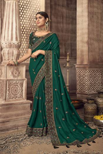 Stylist This Partywear Designer Fine Colour Saree Paired With Blouse.This Saree Are Vichitra Silk And Blouse Are Two Tone Phantom Silk Fabric With Heavy Jari,Resham Embroidery Embroidery,Stone Work Blouse. Buy This Pretty Saree Now.