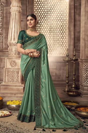 Stylist This Partywear Designer Fine Colour Saree Paired With Blouse.This Saree Are Vichitra Silk And Blouse Are Two Tone Phantom Silk Fabric With Heavy Jari,Resham Embroidery Embroidery,Stone Work Blouse. Buy This Pretty Saree Now.