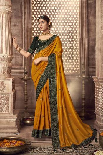 Stylist This Partywear Designer Fine Colour Saree Paired With Blouse.This Saree Are Vichitra Silk And Blouse Are Two Tone Phantom Silk Fabric With Heavy Jari,Resham Embroidery Embroidery,Stone Work Blouse. Buy This Pretty Saree Now.