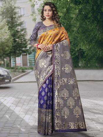 Garb This Partywear Saree Paired With Blouse.This Saree And Blouse Are Lichi Silk Based Fabric With Heavy Wevon Designer Work. Buy This Pretty Saree Now.