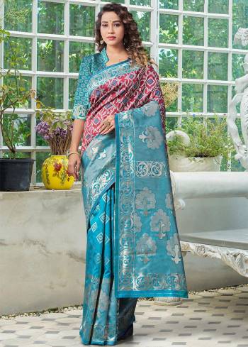 Garb This Partywear Saree Paired With Blouse.This Saree And Blouse Are Lichi Silk Based Fabric With Heavy Wevon Designer Work. Buy This Pretty Saree Now.