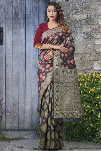 Garb This Partywear Saree Paired With Blouse.This Saree And Blouse Are Lichi Silk Based Fabric With Heavy Wevon Designer Work. Buy This Pretty Saree Now.