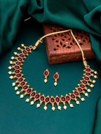 Attrective Look To Your Personality By Pairing Up This Beautiful Necklace With Your Ethnic Attire. This Pretty Set Is In Fine Color Beautified With Stone And Pearl Work. Buy Now.