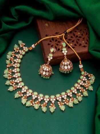 Attrective Look To Your Personality By Pairing Up This Beautiful Necklace With Your Ethnic Attire. This Pretty Set Is In Fine Color Beautified With Stone And Pearl Work. Buy Now.