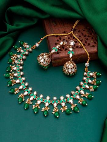 Attrective Look To Your Personality By Pairing Up This Beautiful Necklace With Your Ethnic Attire. This Pretty Set Is In Fine Color Beautified With Stone And Pearl Work. Buy Now.