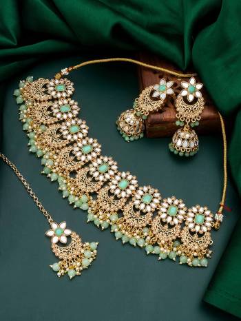 Attrective Look To Your Personality By Pairing Up This Beautiful Necklace With Your Ethnic Attire. This Pretty Set Is In Fine Color Beautified With Stone And Pearl With Kundan Work. Buy Now.