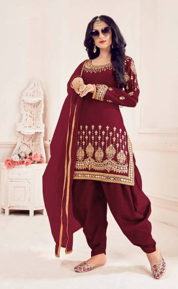 Attrective This Partywear Designer Patiyala Suit In Lovely Color.Its Pretty Designer Embroidery With Real Mirror Work Top Is Bitalian Soft Silk Based Paired With Bitalian Soft Silk Bottom And Net Fabricated Dupatta Which Gives An Attractive To The Suit.