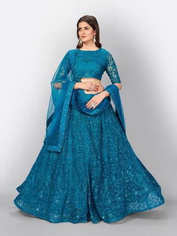 Garb This Partywear Heavy Designer Lehenga Choli And Dupatta In Fine Color Fabricated On Soft Net Beautified With Heavy Attractive Thread,Sequance Embroidery Work.Buy Now. 