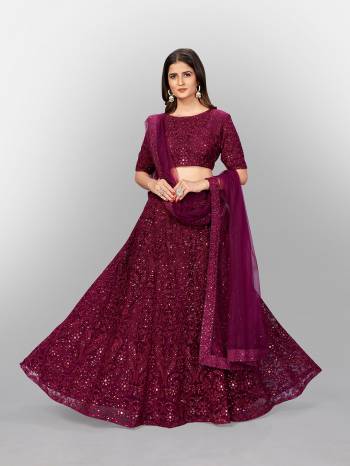 Garb This Partywear Heavy Designer Lehenga Choli And Dupatta In Fine Color Fabricated On Soft Net Beautified With Heavy Attractive Thread,Sequance Embroidery Work.Buy Now. 