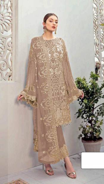 Attrective This Designer Pakistani Suit In Fine Color.Its Pretty Heavy Designer Embroidery Work Top Is Faux Georgette Based Paired With Santoon Bottom And Faux Georgette Fabricated Dupatta Which Gives An Attractive To The Suit.