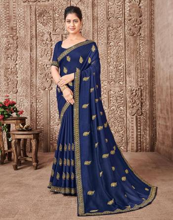 Garb This Designer Partywear Saree Are Fine Saree Paired With Blouse.This Saree And Blouse Are P.C.Vichitra Silk Based Fabric With Designer Jari Embroidery,Stone Work. Buy This Pretty Saree Now.