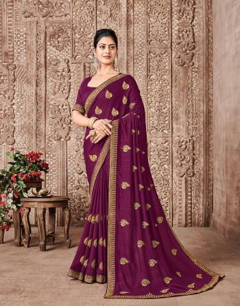 Garb This Designer Partywear Saree Are Fine Saree Paired With Blouse.This Saree And Blouse Are P.C.Vichitra Silk Based Fabric With Designer Jari Embroidery,Stone Work. Buy This Pretty Saree Now.