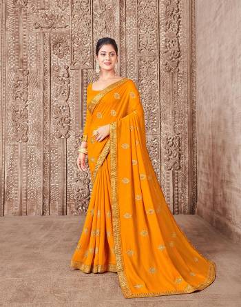 Garb This Designer Partywear Saree Are Fine Saree Paired With Blouse.This Saree And Blouse Are P.C.Vichitra Silk Based Fabric With Designer Jari Embroidery,Stone Work. Buy This Pretty Saree Now.