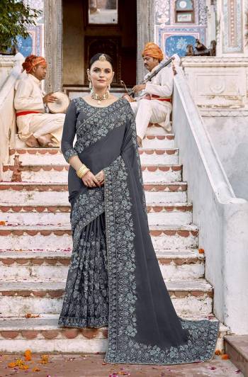 Stylist Looking This Partywear Designer Fine Colour Saree Paired With Blouse.This Saree And Blouse Are Vichitra Silk Fabric With Heavy Designer Embroidery Work. Buy This Pretty Saree Now.