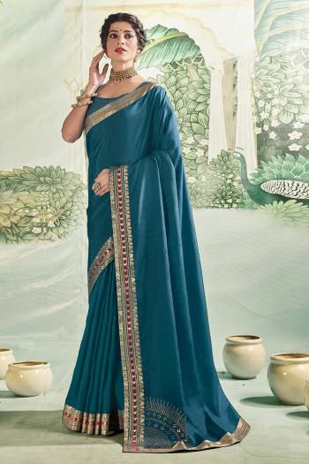 Look This Designer Saree Are Fine Saree Paired With Blouse.This Saree And Blouse Are Vichitra Silk Based Fabric With Designer Corner Swarovshki Butta With Lace Border. Buy This Pretty Saree Now.