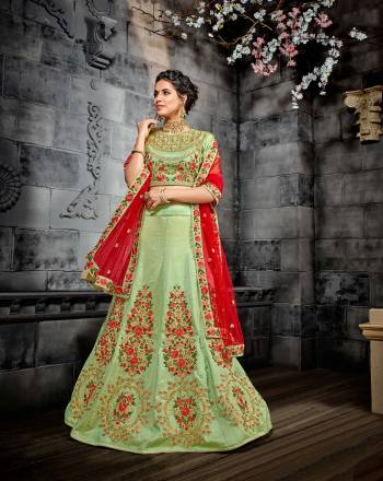 Garb This  Wedding Season Designer Lehenga Choli In Fine Color Fabricated On Silk Beautified Fabric Choli And Lahenga Are Silk With Dupatta Are Net Fabric With Designer Heavy Embroidery Work.Buy Now. 