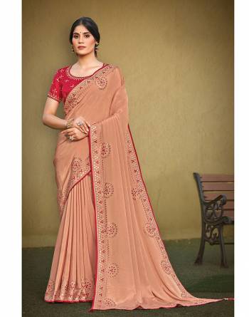 Garb This Partywear Stylist Designer Fine Colour Saree Paired With Blouse.This Saree Are Silk Georgette And Blouse Are Raw Silk Fabric With Heavy Designer Embroidery Work. Buy This Pretty Saree Now.