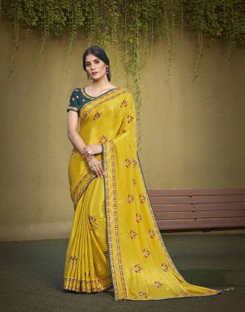 Garb This Partywear Stylist Designer Fine Colour Saree Paired With Blouse.This Saree Are Satin Silk And Blouse Are Raw Silk Fabric With Heavy Designer Embroidery Work. Buy This Pretty Saree Now.