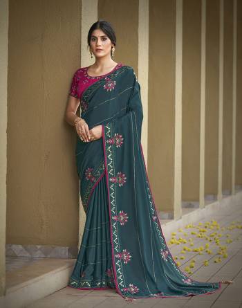 Garb This Partywear Stylist Designer Fine Colour Saree Paired With Blouse.This Saree Are Silk Georgette And Blouse Are Raw Silk Fabric With Heavy Designer Embroidery Work. Buy This Pretty Saree Now.