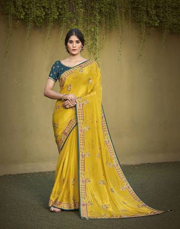 Garb This Partywear Stylist Designer Fine Colour Saree Paired With Blouse.This Saree Are Satin Silk And Blouse Are Raw Silk Fabric With Heavy Designer Embroidery Work. Buy This Pretty Saree Now.