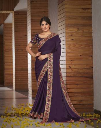 Garb This Partywear Stylist Designer Fine Colour Saree Paired With Blouse.This Saree Are Satin Silk And Blouse Are Raw Silk Fabric With Heavy Designer Embroidery Work. Buy This Pretty Saree Now.