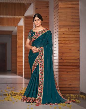 Garb This Partywear Stylist Designer Fine Colour Saree Paired With Blouse.This Saree Are Silk Georgette And Blouse Are Raw Silk Fabric With Heavy Designer Embroidery Work. Buy This Pretty Saree Now.