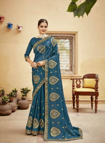 Stylist Looking This Partywear Designer Fine Colour Saree Paired With Blouse.This Saree And Blouse Are Vichitra Silk Fabric With Heavy Designer Embroidery With Stone Work. Buy This Pretty Saree Now.