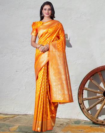 Garb This Traditional Saree Paired With Blouse.This Saree And Blouse Are Lichi Silk Based Fabric With Wevon Self Jari Designer Work. Buy This Pretty Saree Now.