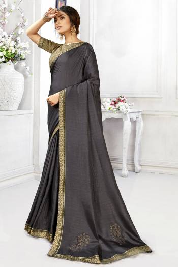 Looking This Designer Fine Color Saree Paired With Blouse.This Saree Are Vichitra Silk And Blouse Are Art Silk Fabric With Designer Swarovski Work. Buy This Pretty Saree Now.