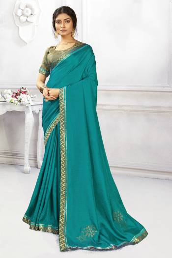 Looking This Designer Fine Color Saree Paired With Blouse.This Saree Are Vichitra Silk And Blouse Are Art Silk Fabric With Designer Swarovski Work. Buy This Pretty Saree Now.