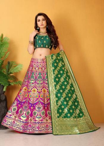 Attrective This Partywear Heavy Designer Lahenga Choli Fine Color,This Lahenha Choli Are Banarasi Silk Fabricated Beautified With Attrective Wevon Designer With Embroideri,Savroski Work.Buy Now. 