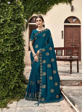 Stylist Looking This Partywear Designer Fine Colour Saree Paired With Blouse.This Saree And Blouse Are Vichitra Silk Fabric With Heavy Designer Jari Embroidery Work. Buy This Pretty Saree Now.