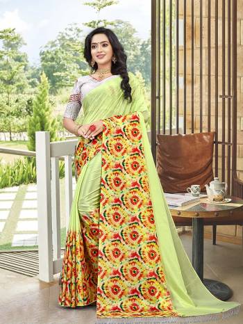 Attrective This Designer Saree Are Fine Saree Paired With Blouse.This Saree Are Chinon And Blouse Are Art Silk Based With Mirror Work Fabric With Designer Printed. Buy This Pretty Saree Now.