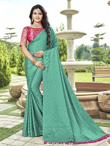 Garb This Designer Saree Are Fine Color Paired With Contrasted Blouse.This Saree Are Satin Georgette And Blouse Are Art Silk Based Wevon Designer With Mirror Work Fabric With Saree Are Printed Designer. Buy This Pretty Saree Now.