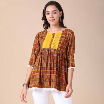 This Good Looking Readymade Short Kurti In Fine Color. Its Short Kurti Are Rayon Fabricated Beautified With Fancy Designer Printed. It Is Light In Weight And Easy To Carry All Day Long. 