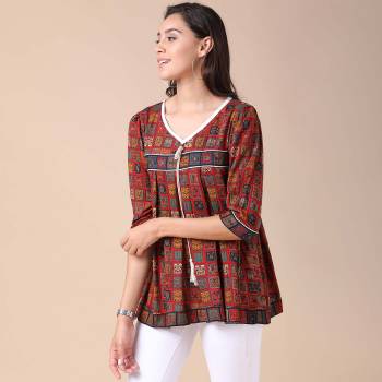 This Good Looking Readymade Short Kurti In Fine Color. Its Short Kurti Are Rayon Fabricated Beautified With Fancy Designer Printed. It Is Light In Weight And Easy To Carry All Day Long. 