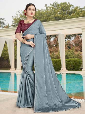 Looking This Designer Partywear Saree Are Fine Saree Paired With Contrasted Blouse.This Saree Are Satin With Stone Work And Blouse Are Art Silk With Sequance Embroidery Work Based Fabric With Designer Saree. Buy This Pretty Saree Now.