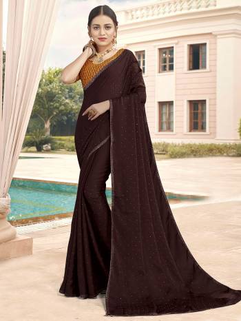 Looking This Designer Partywear Saree Are Fine Saree Paired With Contrasted Blouse.This Saree Are Satin With Stone Work And Blouse Are Art Silk With Sequance Embroidery Work Based Fabric With Designer Saree. Buy This Pretty Saree Now.