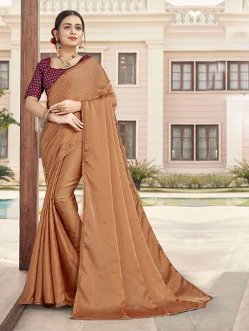 Looking This Designer Partywear Saree Are Fine Saree Paired With Contrasted Blouse.This Saree Are Satin With Stone Work And Blouse Are Art Silk With Sequance Embroidery Work Based Fabric With Designer Saree. Buy This Pretty Saree Now.