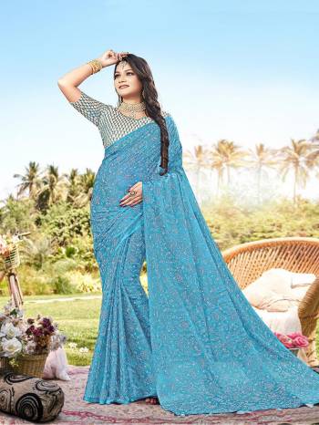 Attrective This Designer Saree Are Fine Saree Paired With Blouse.This Saree Are Chiffon And Blouse Are Art Silk Based With Embroidery Work Fabric With Designer Printed. Buy This Pretty Saree Now.