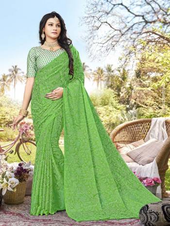 Attrective This Designer Saree Are Fine Saree Paired With Blouse.This Saree Are Chiffon And Blouse Are Art Silk Based With Embroidery Work Fabric With Designer Printed. Buy This Pretty Saree Now.