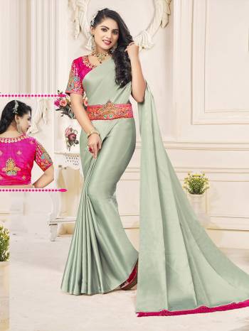 Garb This Designer Partywear Saree Are Fine Saree Paired With Contrasted Blouse And Belt.This Saree Are Satin Chiffon And Blouse And Belt Are Art Silk Based Fabric With Designer Embroidery Work. Buy This Pretty Saree Now.