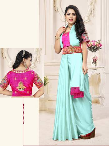 Garb This Designer Partywear Saree Are Fine Saree Paired With Contrasted Blouse And Belt.This Saree Are Satin Chiffon And Blouse And Belt Are Art Silk Based Fabric With Designer Embroidery Work. Buy This Pretty Saree Now.