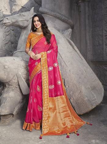 Attrective Look Pretty In This Beautifull Traditional Saree In Lovely Color Paired With Contrased Blouse. This Saree Are Organza,Banarasi Silk And Blouse Are Fabricated On Raw Silk With Designer Wevon Rich Pallu With Embroidery Peach Border,Blouse. Buy This Saree Now