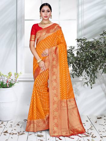 Garb This Pretty Angelic Partywear Look Wearing This Heavy Designer Weaving Work Saree In Fine Color Paired With Blouse. This Saree And Blouse Is Organza Fabricated.Attractive Look To Your Personality. 