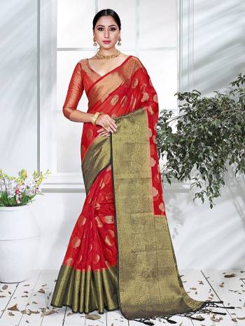 Garb This Pretty Angelic Partywear Look Wearing This Heavy Designer Weaving Work Saree In Fine Color Paired With Blouse. This Saree And Blouse Is Organza Fabricated.Attractive Look To Your Personality. 