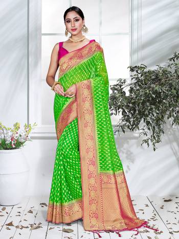 Garb This Pretty Angelic Partywear Look Wearing This Heavy Designer Weaving Work Saree In Fine Color Paired With Blouse. This Saree And Blouse Is Organza Fabricated.Attractive Look To Your Personality. 