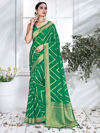 Garb This Pretty Angelic Partywear Look Wearing This Heavy Designer Weaving Work Saree In Fine Color Paired With Blouse. This Saree And Blouse Is Organza Fabricated.Attractive Look To Your Personality. 