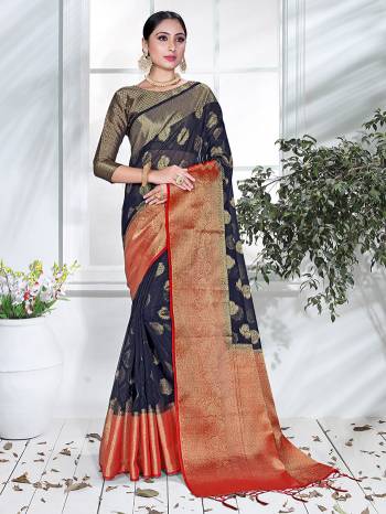 Garb This Pretty Angelic Partywear Look Wearing This Heavy Designer Weaving Work Saree In Fine Color Paired With Blouse. This Saree And Blouse Is Organza Fabricated.Attractive Look To Your Personality. 