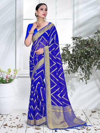 Garb This Pretty Angelic Partywear Look Wearing This Heavy Designer Weaving Work Saree In Fine Color Paired With Blouse. This Saree And Blouse Is Organza Fabricated.Attractive Look To Your Personality. 